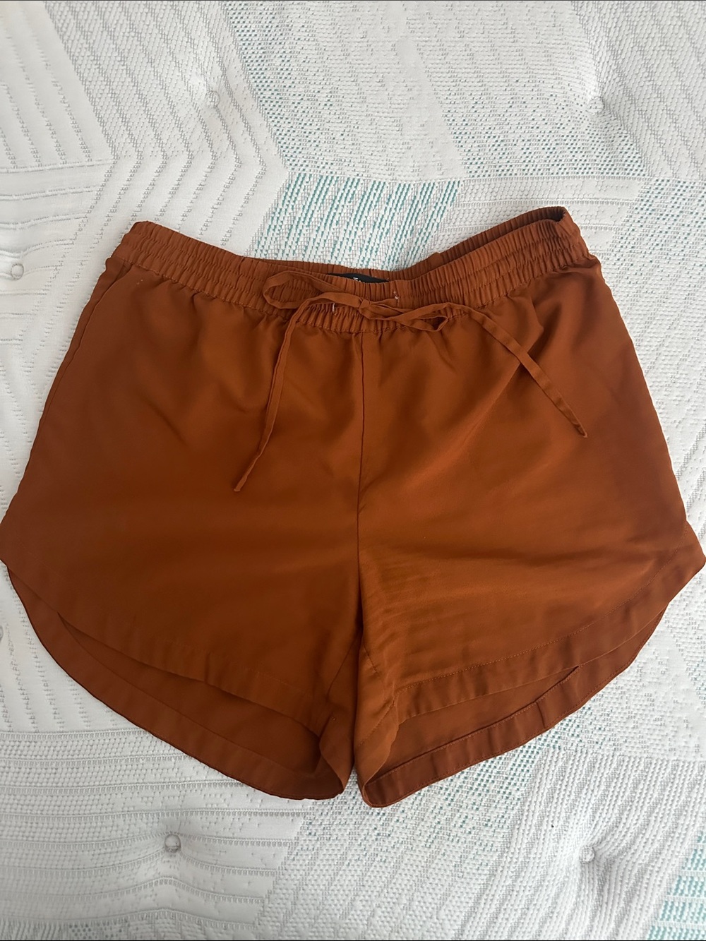 ICÔNE Women’s Relaxed Drawstring Shorts in Rust